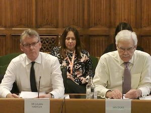 Chief executive of the Care Quality Commission (CQC) Sir Julian Hartley (left), and chairman of the CQC Ian Dilks appearing before the Health and Social Care Committee in the House of Commons, London