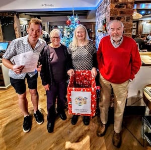 Manager James with Sue, Ruth and Stephen - Ludlow food bank volunteers