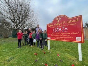 James Thompson, from Powys County Council’s Waste Awareness Team and Jenny Turner from European Recycling Platform (ERP UK) presenting the £300 Amazon voucher to the Eco Committee at Radnor Valley CP School.