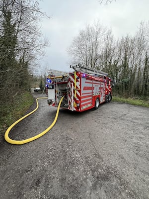 The crews used hoses to deal with the fire. Picture: Amber Watch Wellington.