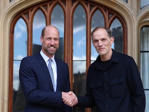 William shakes hands with England manager Thomas Tuchel in front of a doorway at Windsor Castle