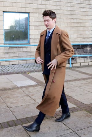 Alexander Westwood leaves Wolverhampton Crown Court dressed in long brown coat similar to that of Doctor Who