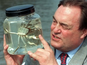 Deputy Prime Minister John Prescott takes a close look at a Chinese Mitten Crab called Dennis (Ben Curtis/PA)