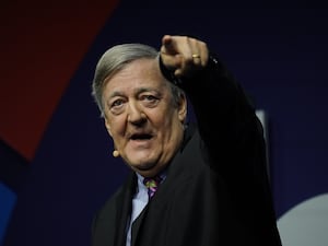 Sir Stephen Fry pointing