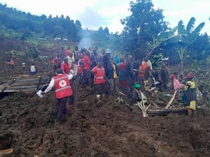 Uganda Red Cross workers search for bodies