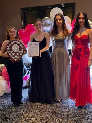 Julia Cohen (left) holding the teachers shield, followed by (left to right) Matilda Taylor, Izzy Marsh and Amelie Brookes who received their student letters.