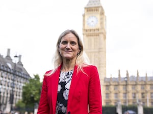 Kim Leadbeater poses outside Parliament