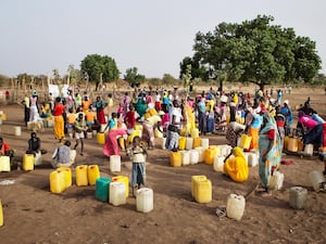 Refugees collecting water in South Sudan