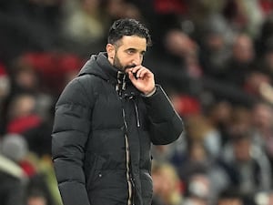 Ruben Amorim puts his hand to his mouth on the touchline