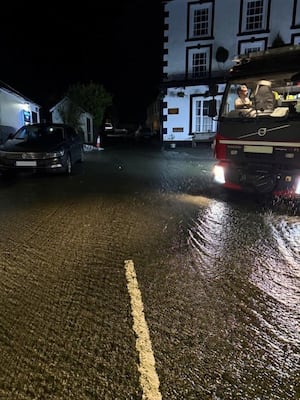 Fire crews had to pump water from properties in Llanwrtyd Wells (Image: Mid and West Wales Fire and Rescue Service)