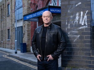 Ross Kemp stands on the set of EastEnders