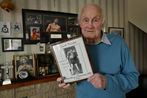 Colin Hough from Shrewsbury proudly holding up his boxing record.