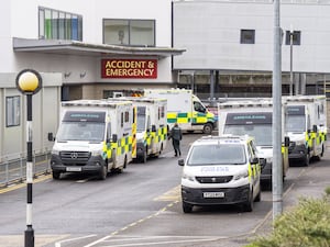 Exterior view of Victoria Hospital in Kirkcaldy, with ambulances parked outside