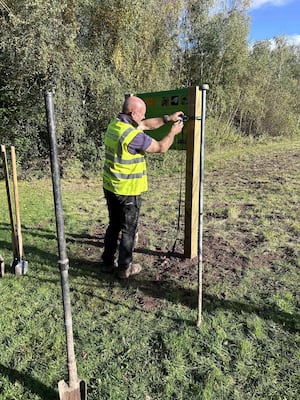 Installing the new Butterfly Conservation Sign