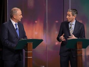 Tanaiste and leader of Fianna Fail Micheal Martin (left) and Taoiseach and leader of Fine Gael Simon Harris during the general election leaders’ debate at RTE studios in Dublin