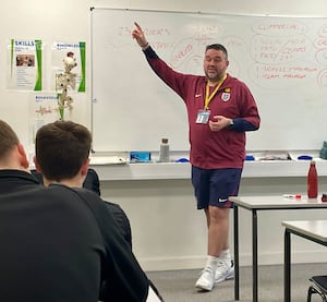 England Lionesses kit man Kevin Fenner talking to the sports students at Telford College. 