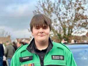 A teenager boy wearing a uniform