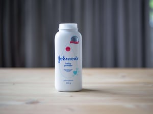 A Johnson's baby powder product resting on a table