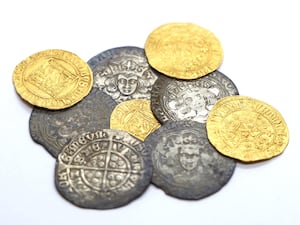 A number of historic gold and silver coins