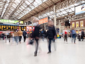 Passengers on the concourse at Victoria station