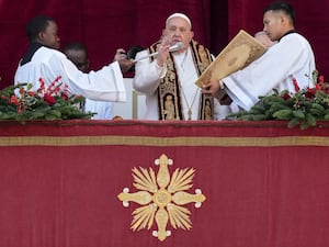 Pope Francis delivers the Urbi et Orbi (Latin for ‘to the city and to the world’) Christmas Day blessing from the main balcony of St Peter’s Basilica at the Vatican