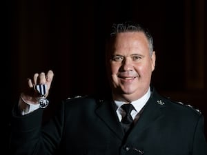 John Caldwell after being decorated with the King’s Police Medal in November 2024