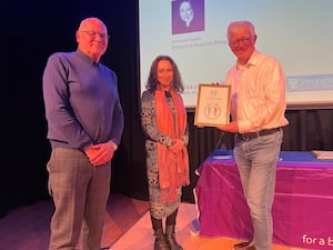 Amanda Jones, from Shropshire Supports Refugees, was joined by Councillor Phil Gillam (right) for the recognition.