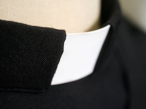 Close-up of a vicar's dog collar