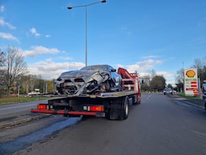 The car after being removed from the house