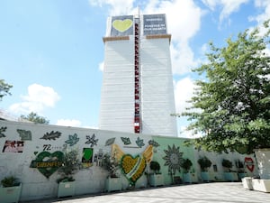 Grenfell Tower covered in tarpaulins