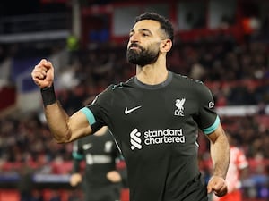 Liverpool’s Mohamed Salah celebrates after scoring