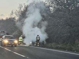 Firefighters were pictured tackling the blaze