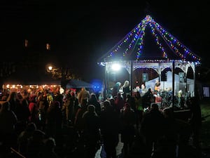 The sparkly bandstand and market stalls in Llandrindod Wells’ Temple Gardens during the light switch-on. Image: Andy Compton