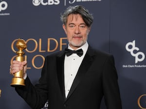 Peter Straughan with the award for best screenplay