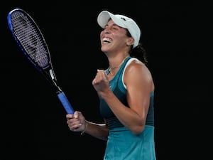 Madison Keys celebrates beating Iga Swiatek