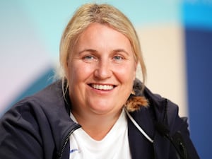 Emma Hayes smiles in a United States press conference at the Paris 2024 Olympic Games