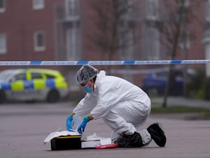 A forensics officer at the scene