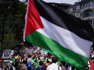 A Palestine flag being waved