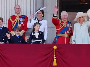 Prince George, the Prince of Wales, Prince Louis, the Princess of Wales, Princess Charlotte, and the King and Queen on the balcony of Buckingham Palace in June