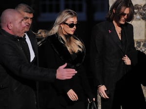 Kate Cassidy and Damian Hurley (right) arrive for the funeral service of One Direction singer Liam Payne