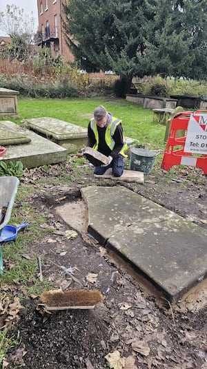 The stone being put back in place.