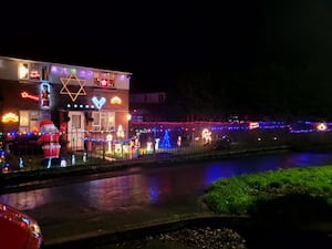 Residents on two Knighton housing estates have decorated the front of their houses for charity for the 11th year running.