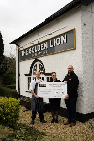 (l to r) Golden Lion employees Richard Weston, Lucy Wilkinson-Blake and Allan Parrington, general manager. 