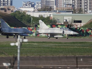 Taiwan’s fighter jets prepare to take off at an airbase in Hsinchu, northern Taiwan