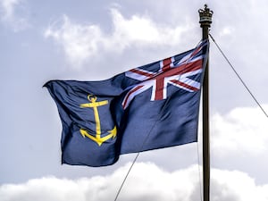 The ship’s ensign during the Service of Dedication for a Royal Fleet Auxiliary ship