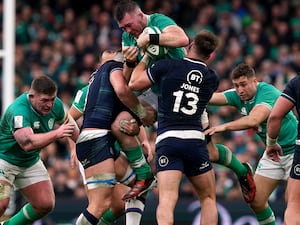 Ireland’s Peter O’Mahony is tackled by Scotland’s Jack Dempsey and Huw Jones during last year's Guinness Six Nations match in Dublin