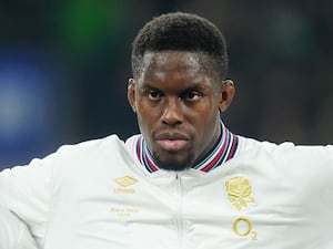 Maro Itoje looks focused during the national anthem