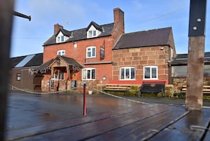 The Royal Hill Inn is in a rural area, surrounded by the countryside