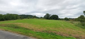 Plans for a barn near the Brynderwen motte site in Abermule has been approved by councillors. From Google Streetview.