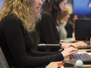 People at work at keyboards